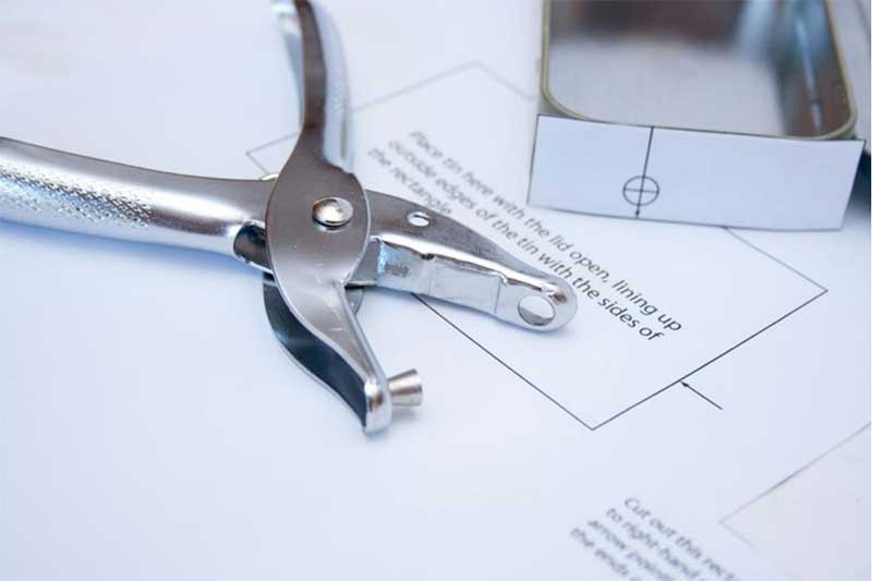 Use paper-hole punch to make 1/4 hole